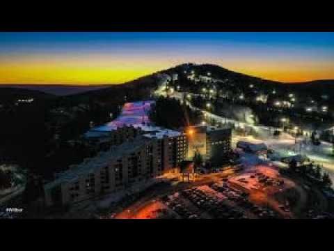 Interior video tour of a renovated Silver Creek studio at Snowshoe Resort that sleeps four and is ready to rent, listed for $105,000.